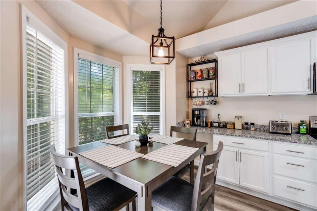 2219 Harper Drive Villa Rica, GA 30180 - Photo 9 of 25 a view of a dining room with furniture window and outside view