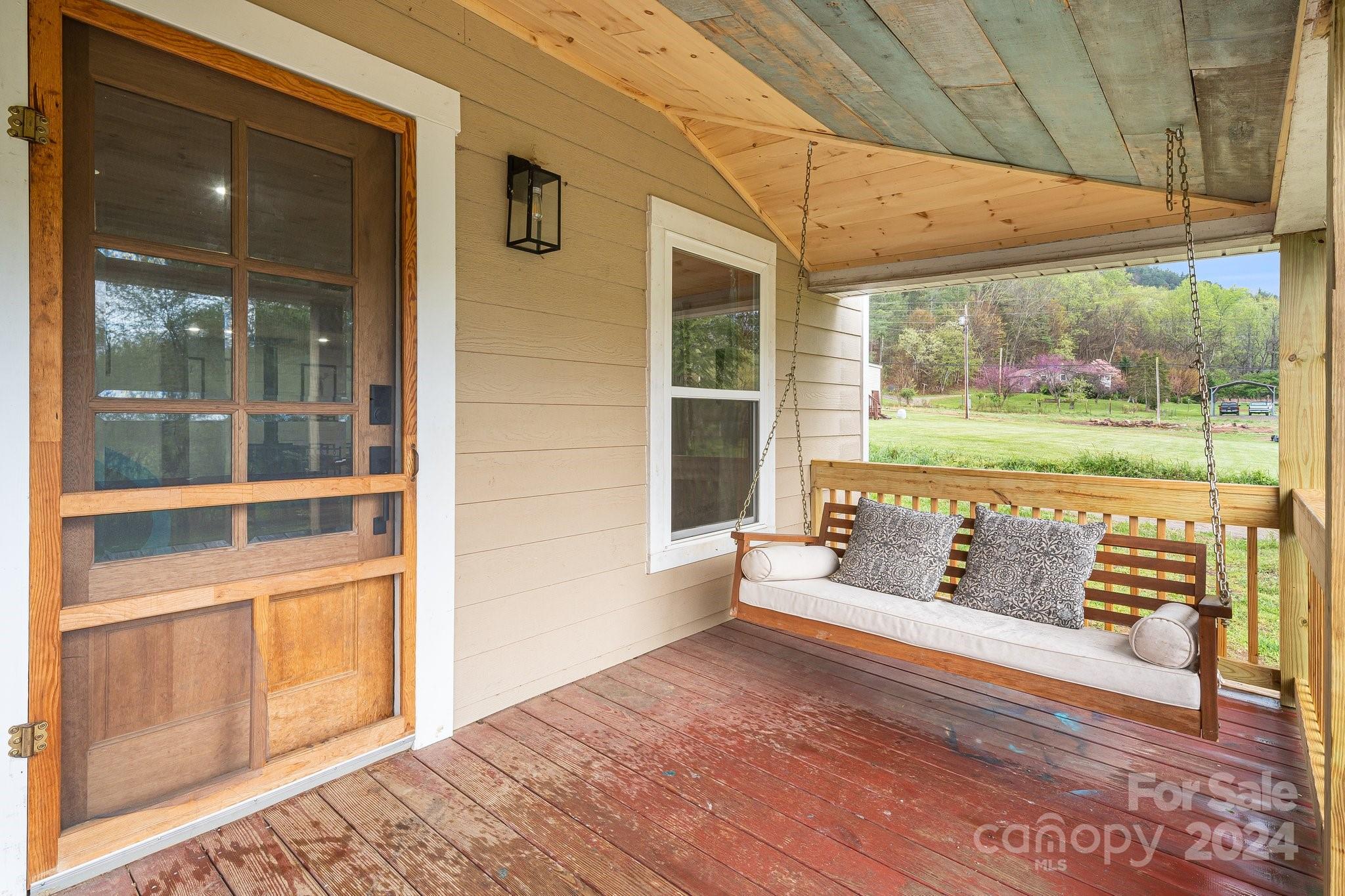 99 Cook Road Hot Springs, NC 28743 - Photo 23 of 26 a view of a back yard from a patio