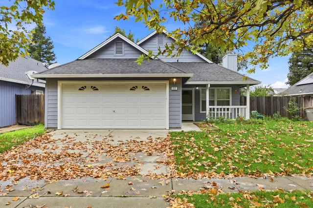 front view of a house with a small yard