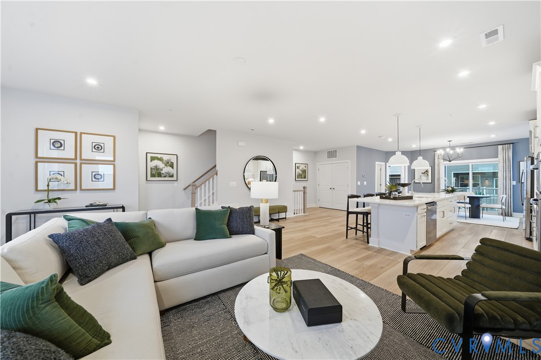 9881 Tuco Street, Unit B Glen Allen, VA 23059 - Photo 12 of 50 a living room with furniture and a wooden floor