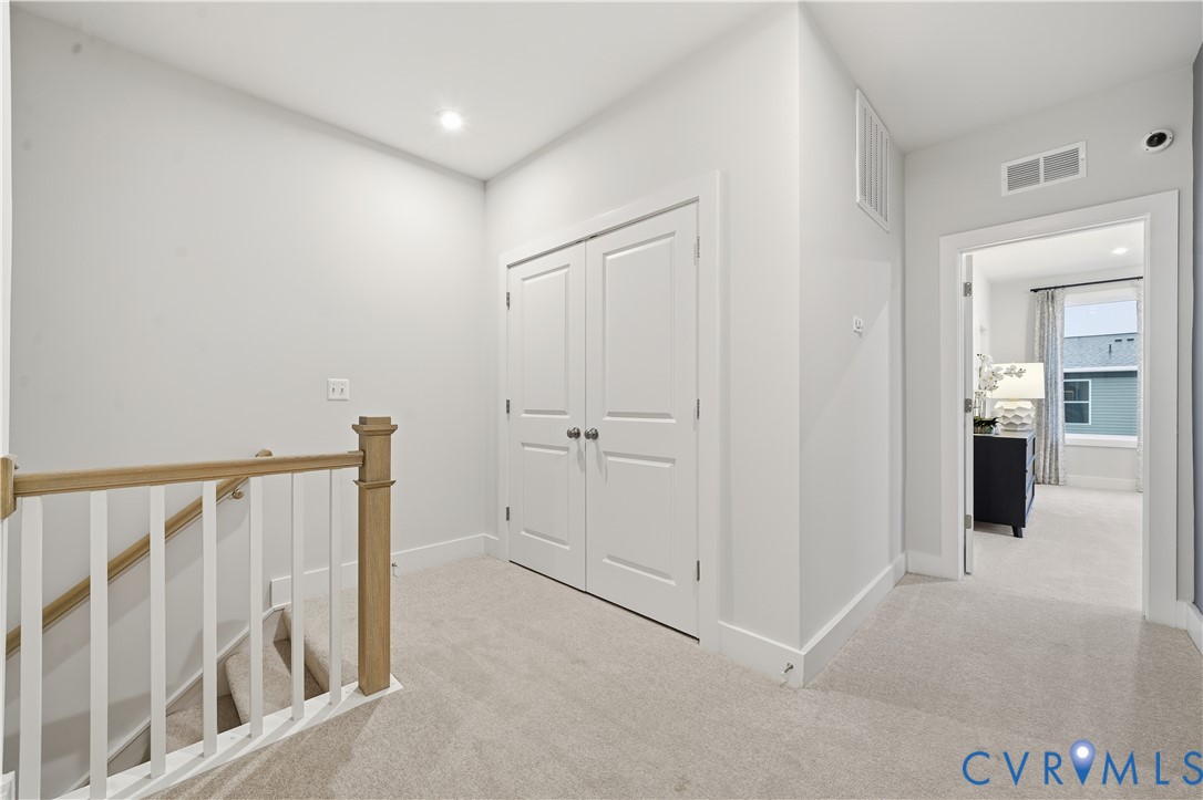 9881 Tuco Street, Unit B Glen Allen, VA 23059 - Photo 21 of 50 a view of a hallway with closet area