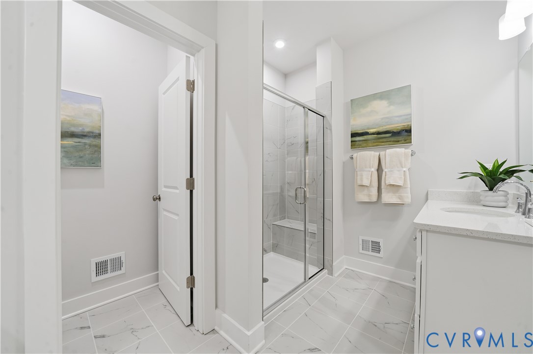 9881 Tuco Street, Unit B Glen Allen, VA 23059 - Photo 32 of 50 a bathroom with a shower and a sink