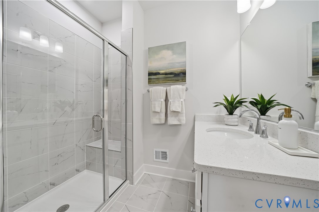 9881 Tuco Street, Unit B Glen Allen, VA 23059 - Photo 34 of 50 a bathroom with a shower and a sink
