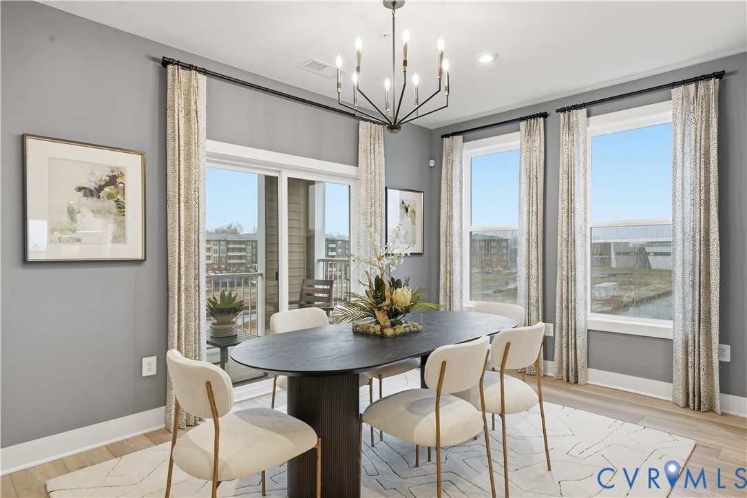 9881 Tuco Street, Unit B Glen Allen, VA 23059 - Photo 4 of 50 a view of a dining room with furniture window and outside view