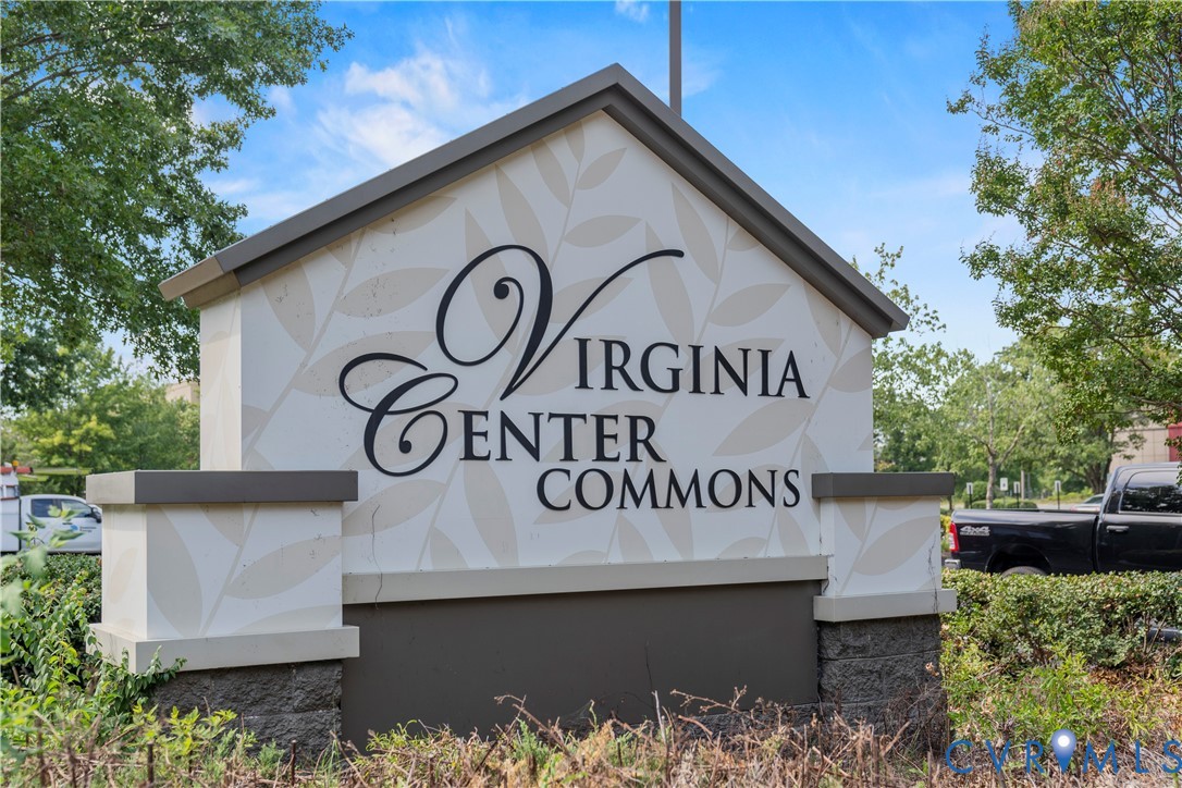 9881 Tuco Street, Unit B Glen Allen, VA 23059 - Photo 45 of 50 a sign on a pole on a street
