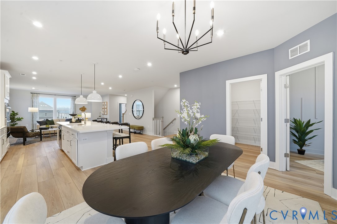 9881 Tuco Street, Unit B Glen Allen, VA 23059 - Photo 7 of 50 a living room with furniture kitchen and a table