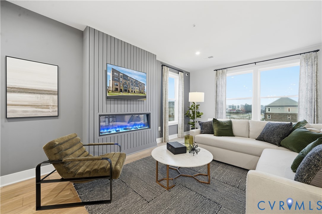 9881 Tuco Street, Unit B Glen Allen, VA 23059 - Photo 9 of 50 a living room with furniture and a large window