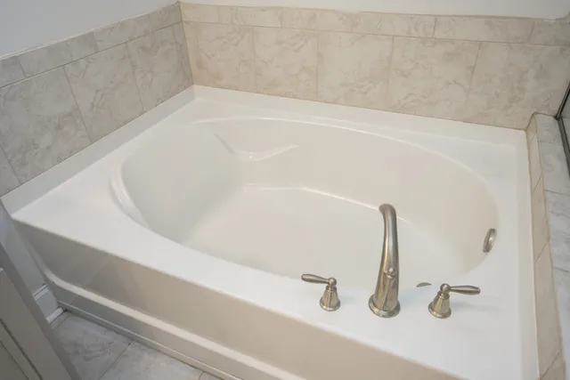 a close up of a bathtub