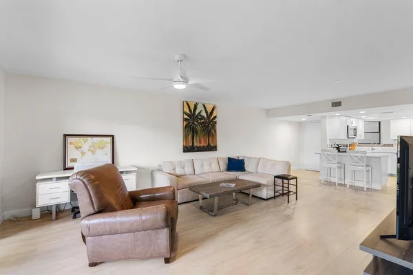 a living room with furniture and a couch