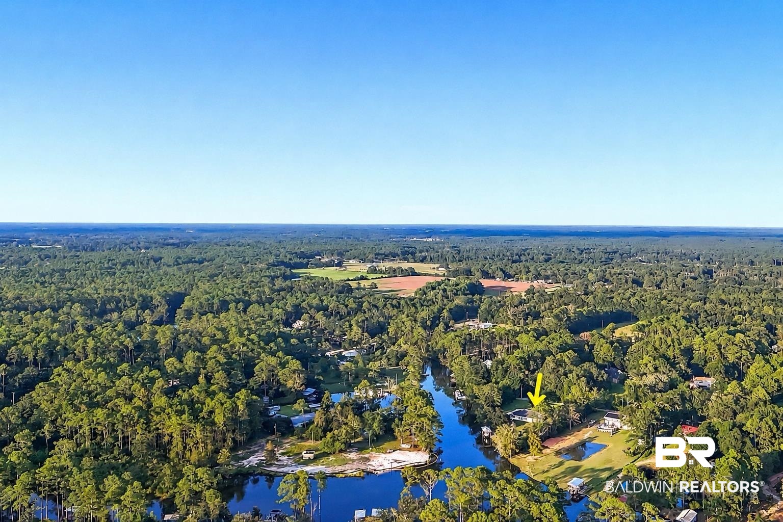 9825 Wolf Creek Ridge Elberta, AL 36530 - Photo 73 of 76 Aerial perspective showcasing a property situated on a waterway, surrounded by mature trees
