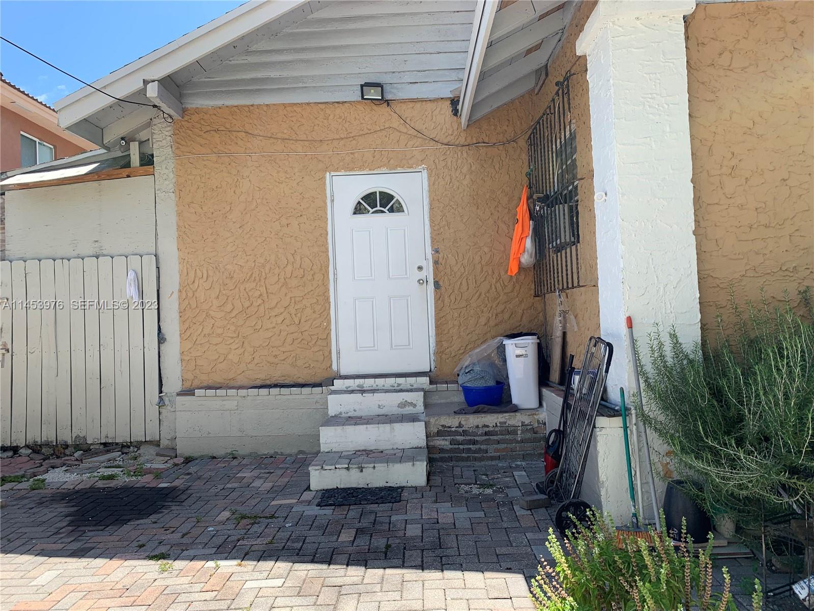 1104 Northwest 6 Street Miami, FL 33136 - Photo 4 of 16 a view of front door of house