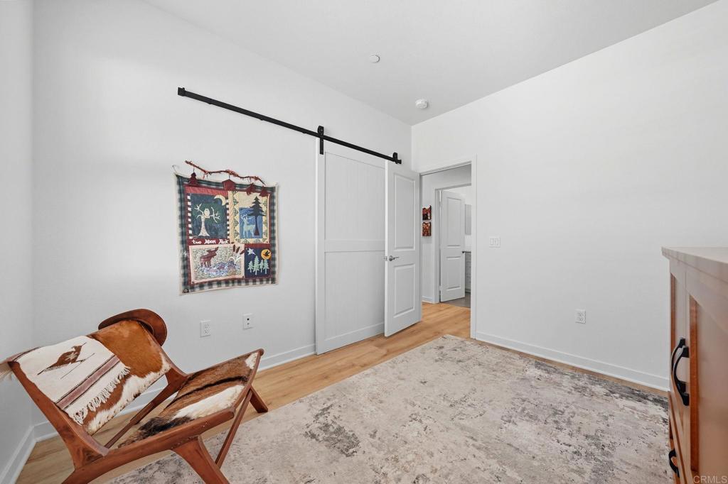 122 Diamante Road San Marcos, CA 92078 - Photo 18 of 36 a very nice looking room with a workspace