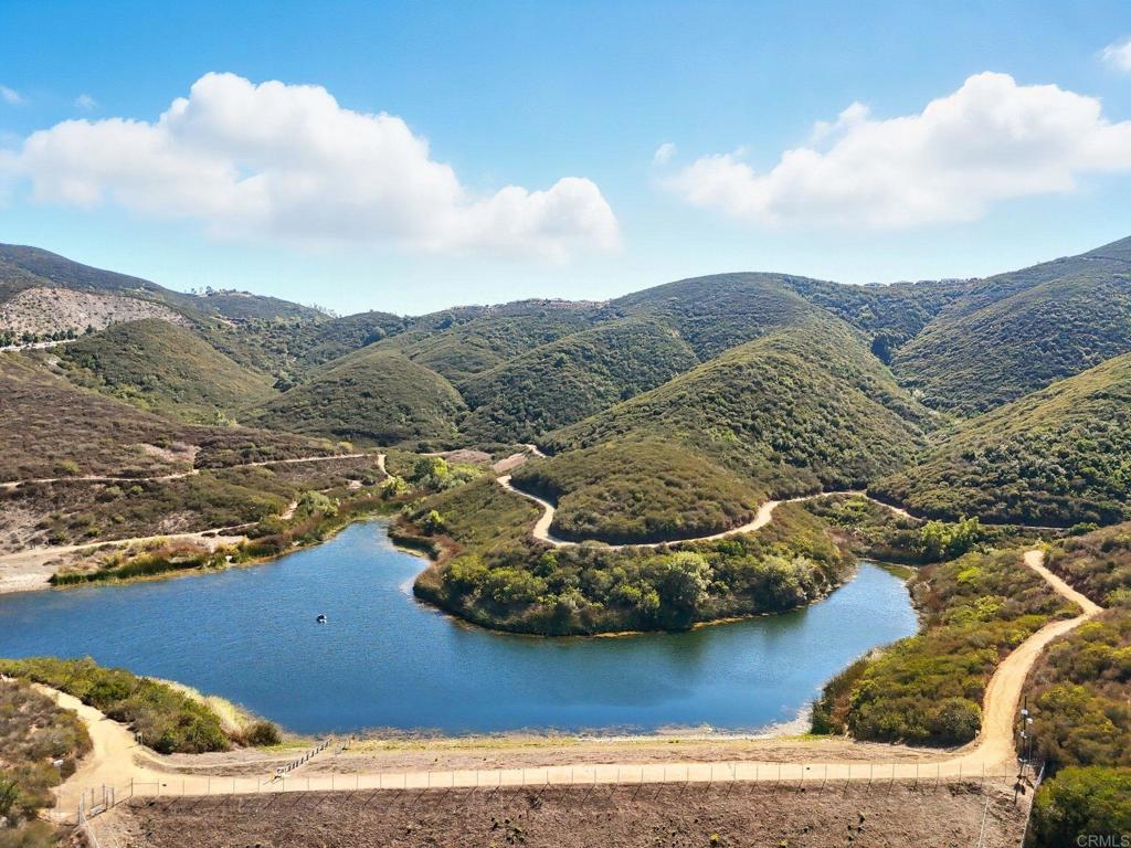 122 Diamante Road San Marcos, CA 92078 - Photo 34 of 36 a view of a house with a mountain