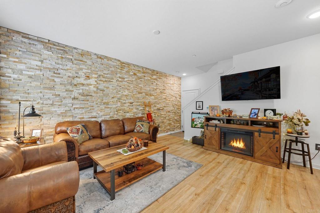 122 Diamante Road San Marcos, CA 92078 - Photo 10 of 36 a living room with furniture and a flat screen tv