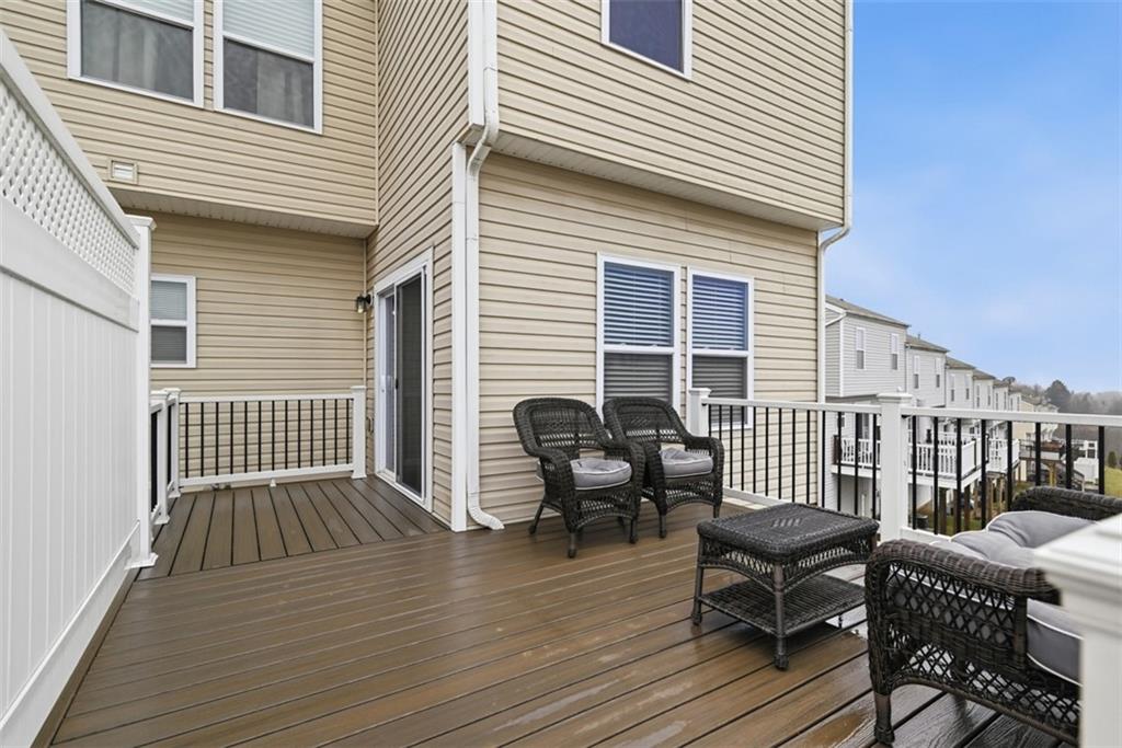139 Rylie Drive Harmony, PA 16037 - Photo 39 of 46 a view of a roof deck with chair and wooden floor