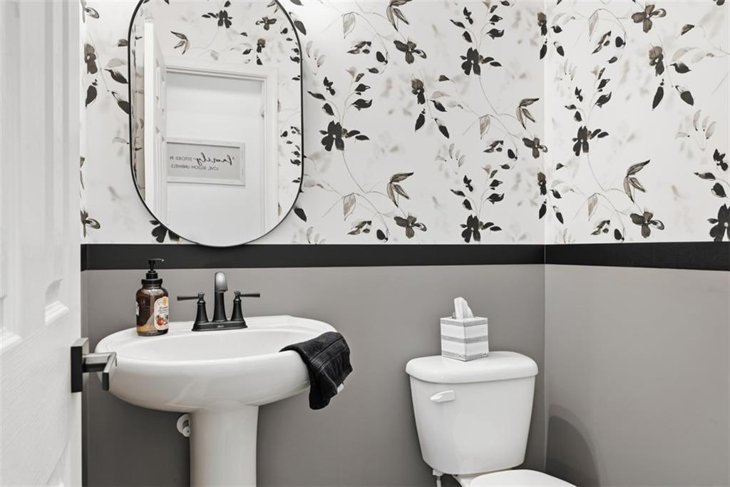 139 Rylie Drive Harmony, PA 16037 - Photo 40 of 46 a bathroom with a sink and a mirror
