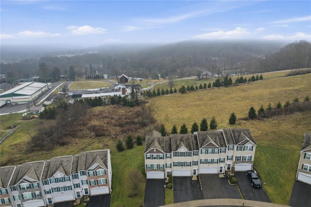 139 Rylie Drive Harmony, PA 16037 - Photo 4 of 46 a view of a lake with a mountain view