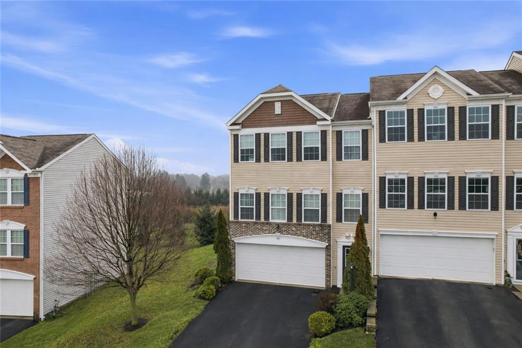 139 Rylie Drive Harmony, PA 16037 - Photo 46 of 46 a front view of a house with a garden