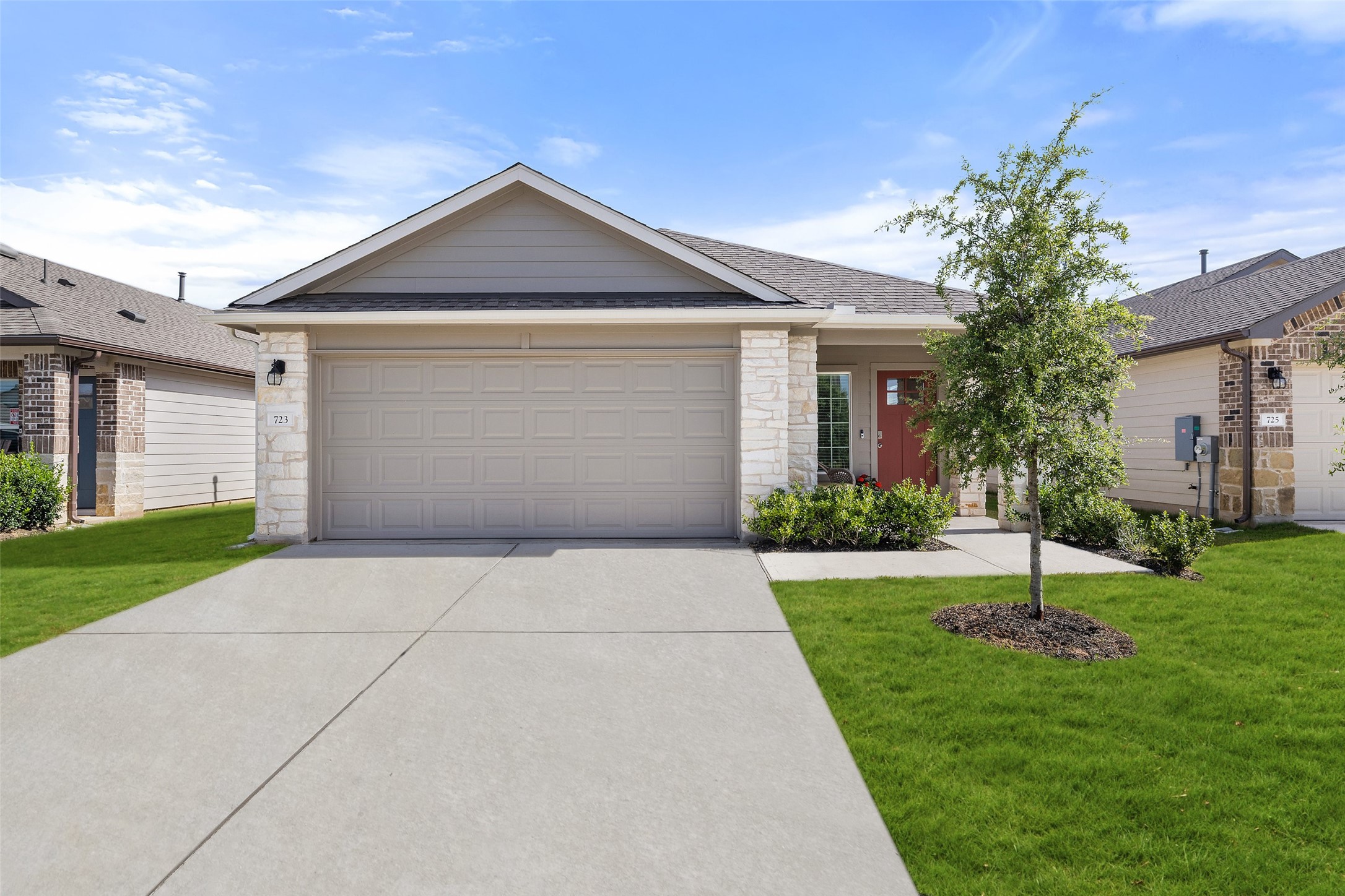 723 Aster Place Bastrop, TX 78602 - Photo 1 of 1 a front view of house with yard