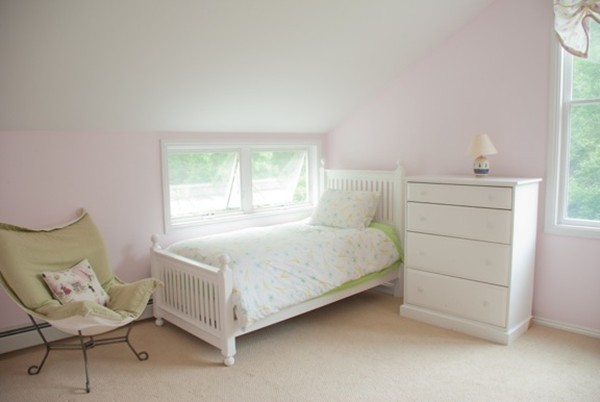 142 Argilla Road Ipswich, MA 01938 - Photo 13 of 26 a bedroom with a bed and a chair