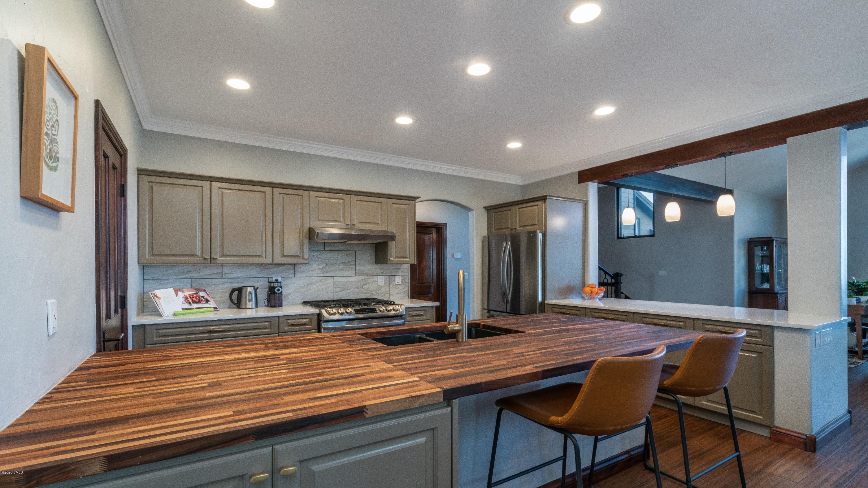 52 Andover Trail Edwards, CO 81632 - Photo 11 of 33 a kitchen with stainless steel appliances granite countertop a sink counter space and cabinets