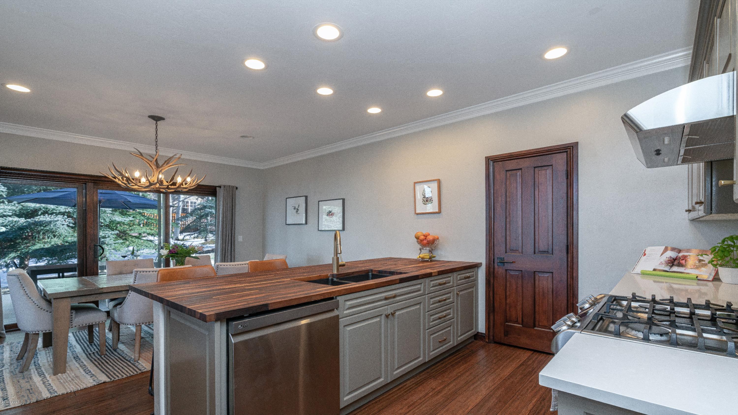 52 Andover Trail Edwards, CO 81632 - Photo 12 of 33 a kitchen with a table and chairs in it