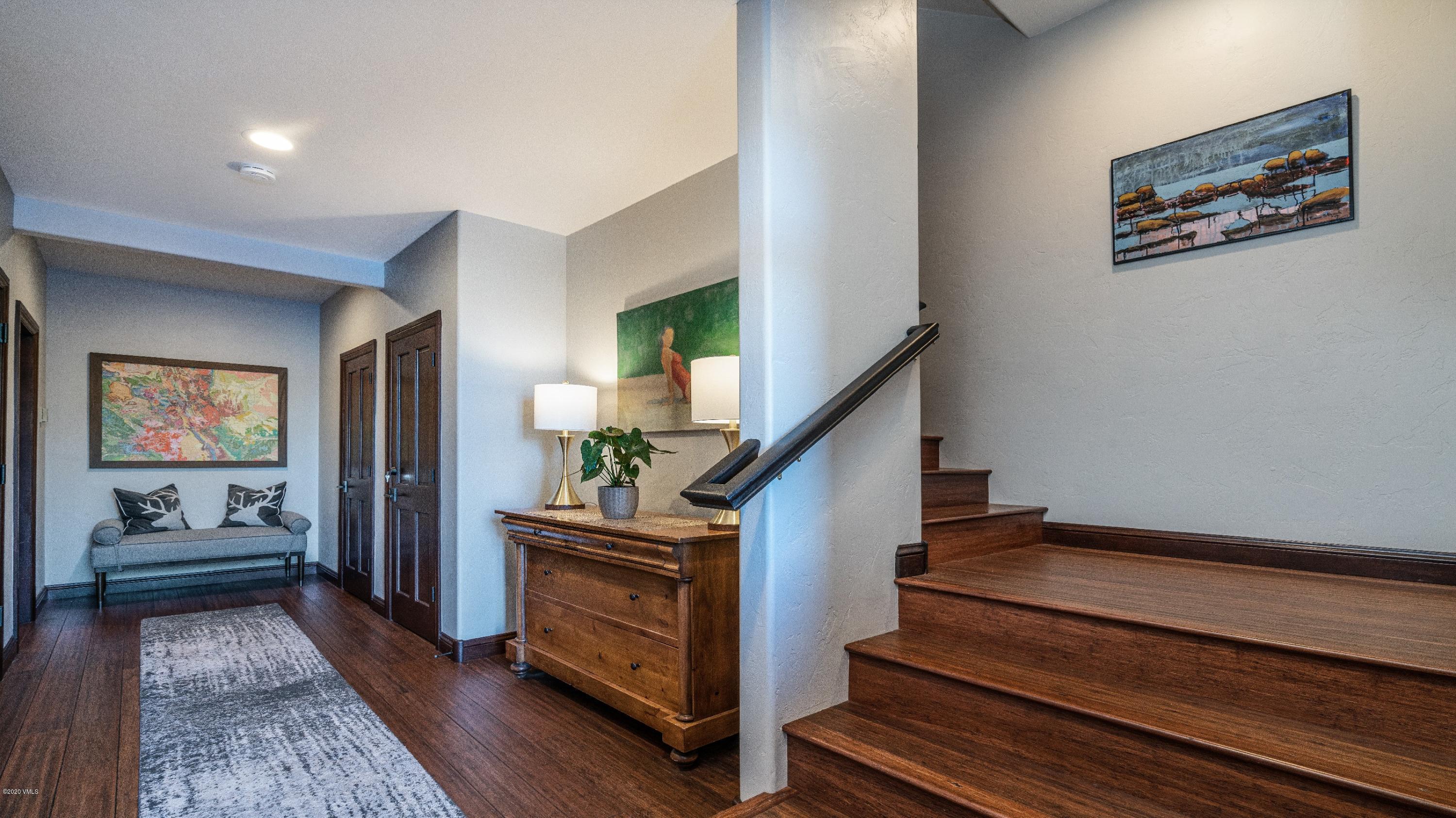52 Andover Trail Edwards, CO 81632 - Photo 18 of 33 a view of entryway and hall with wooden floor