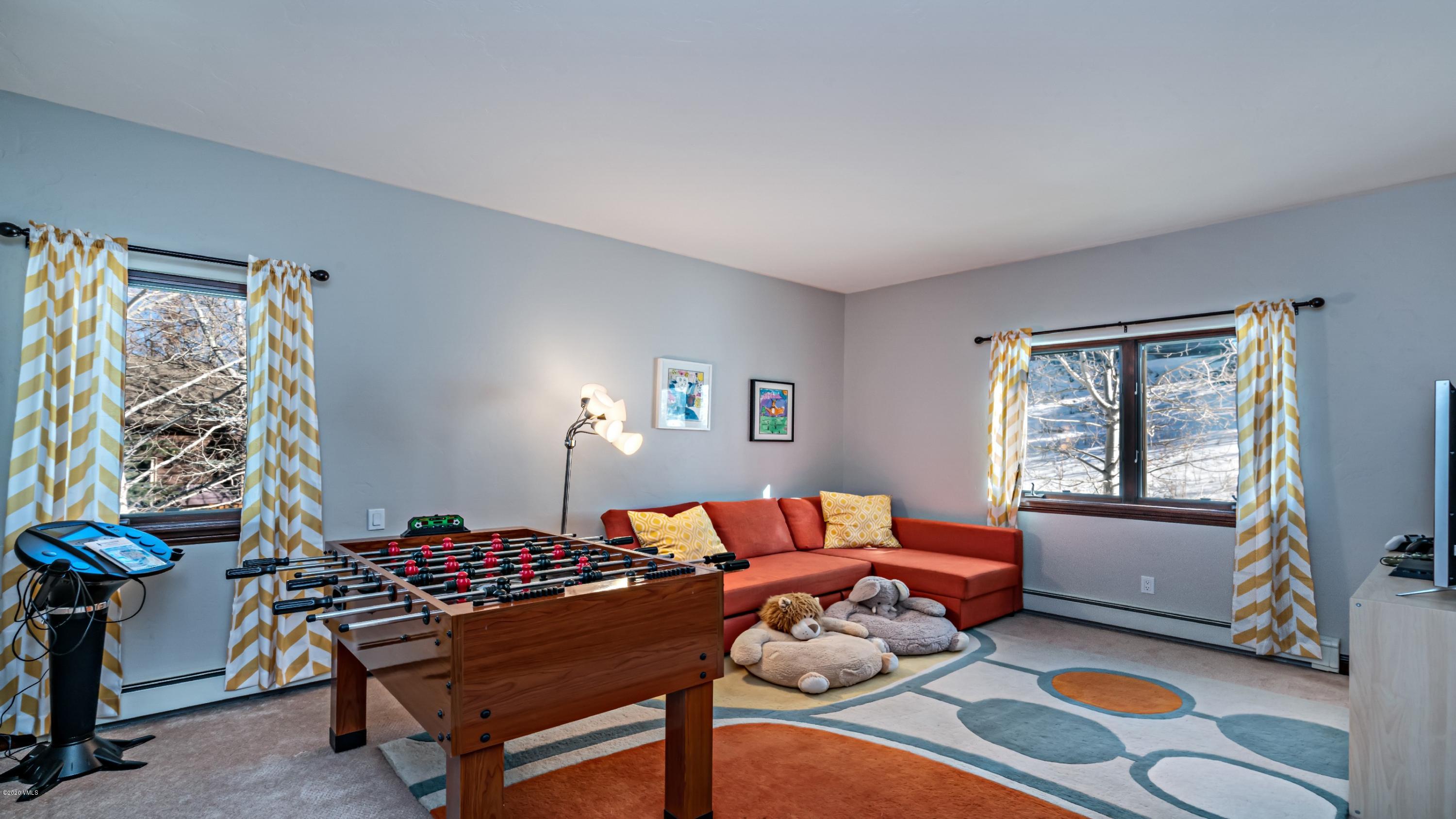 52 Andover Trail Edwards, CO 81632 - Photo 29 of 33 a bedroom with furniture and a window