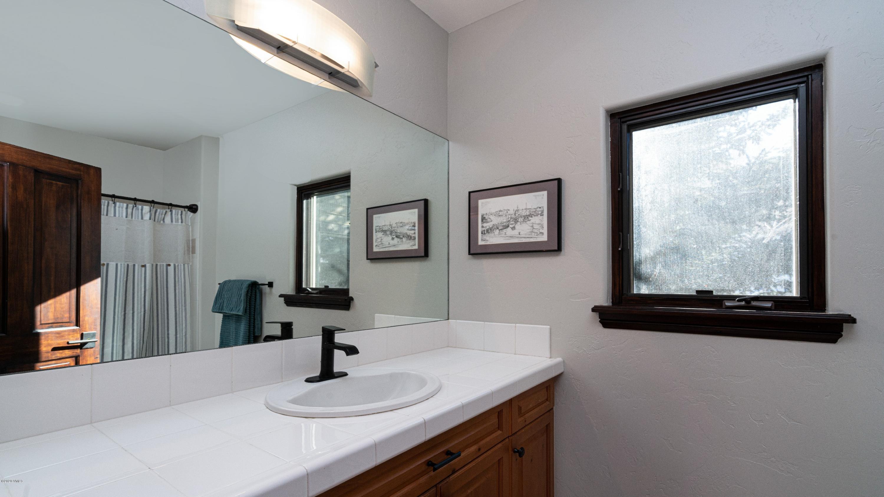 52 Andover Trail Edwards, CO 81632 - Photo 30 of 33 a bathroom with a sink and a mirror