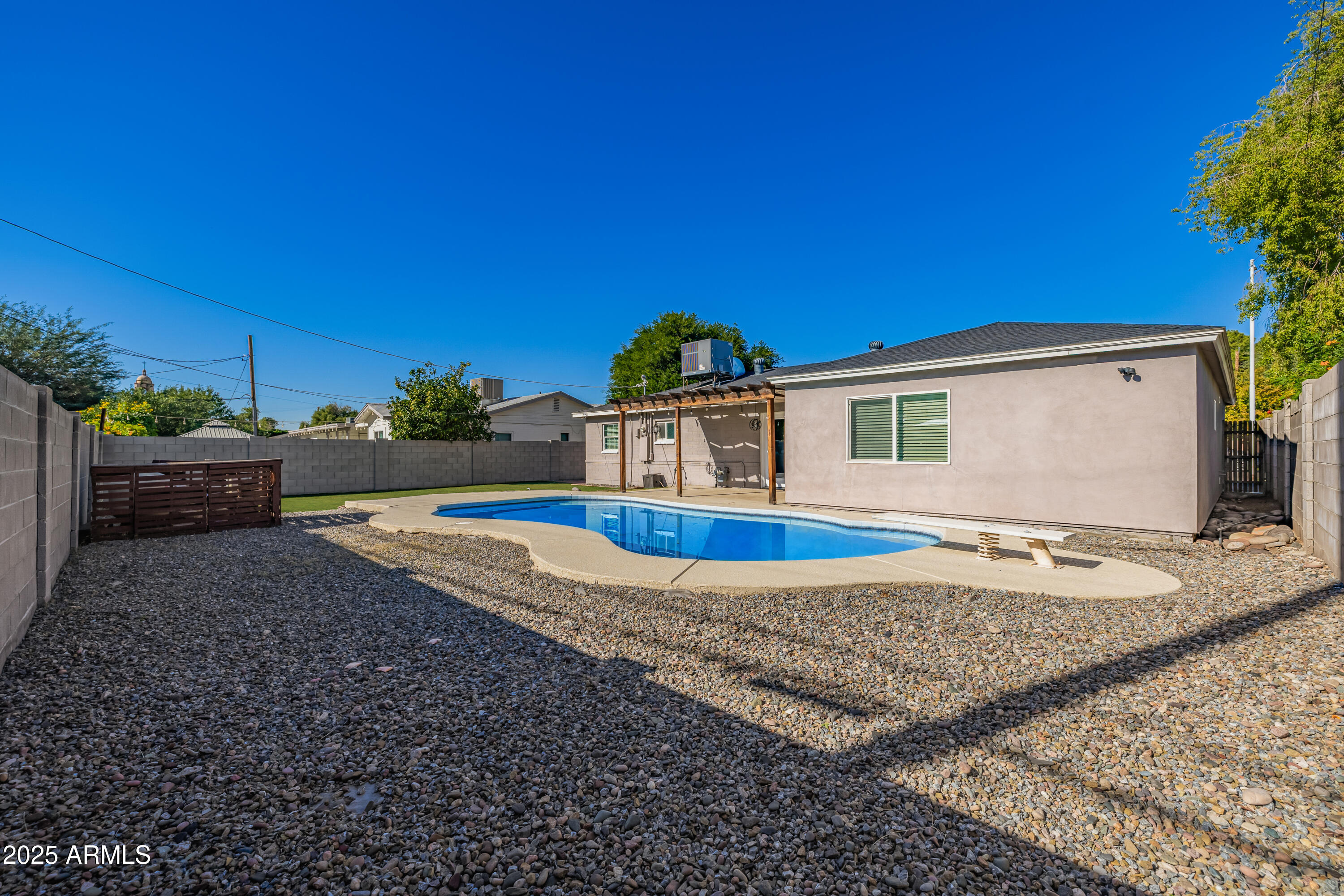 2439 East Minnezona Avenue Phoenix, AZ 85016 - Photo 21 of 25 a view of a house with backyard and sitting area