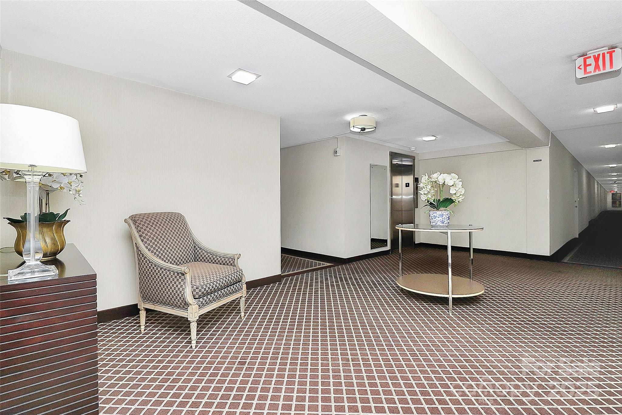 1300 Queens Road, Unit 405 Charlotte, NC 28207 - Photo 27 of 36 a living room with a furniture