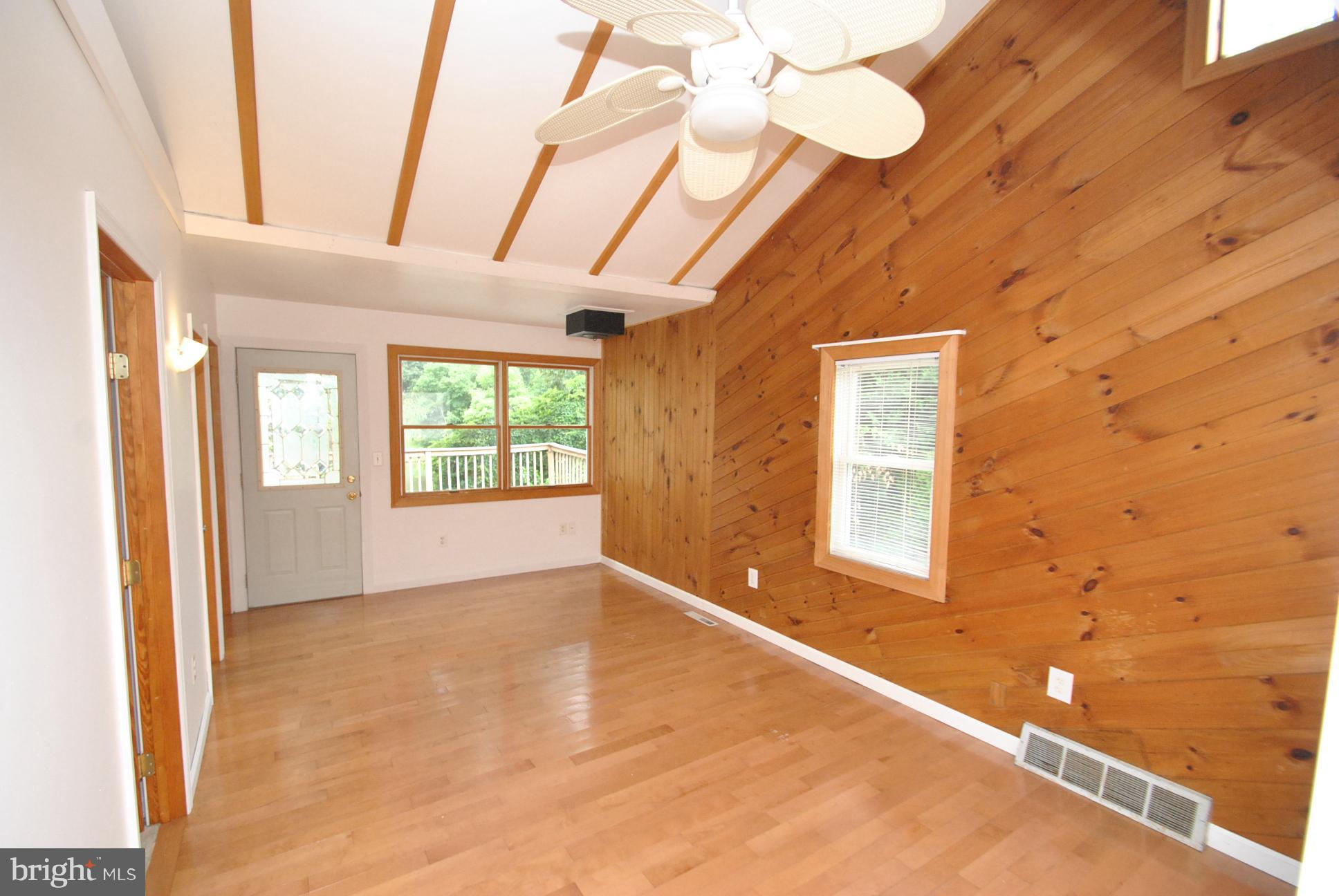 1322 Edna Road Pasadena, MD 21122 - Photo 22 of 30 2 STORY OPEN LIVING ROOM WITH WOOD STOVE HOOK UP