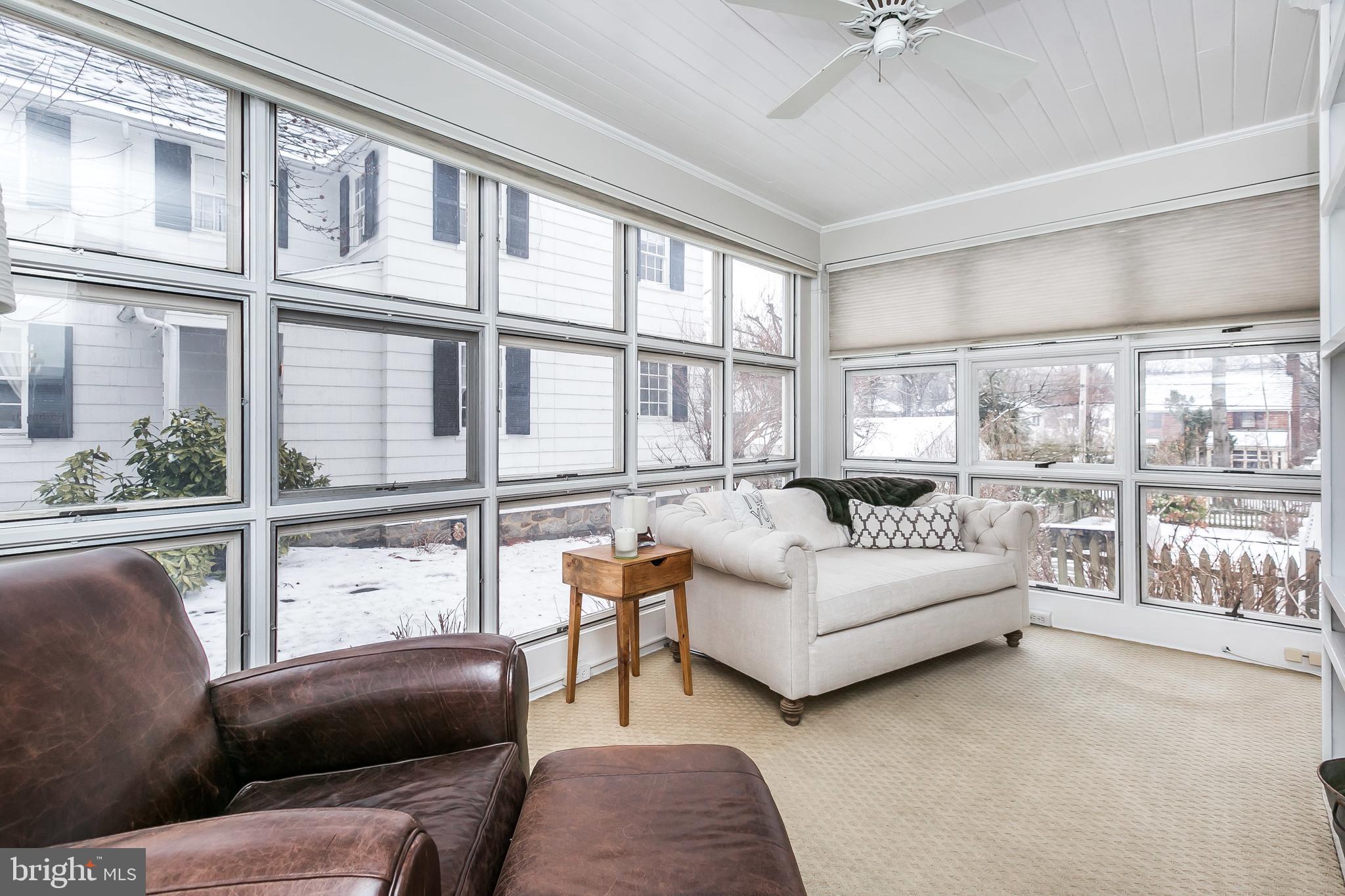 317 Tunbridge Road Baltimore, MD 21212 - Photo 11 of 42 The sunroom is the family dog's favorite spot