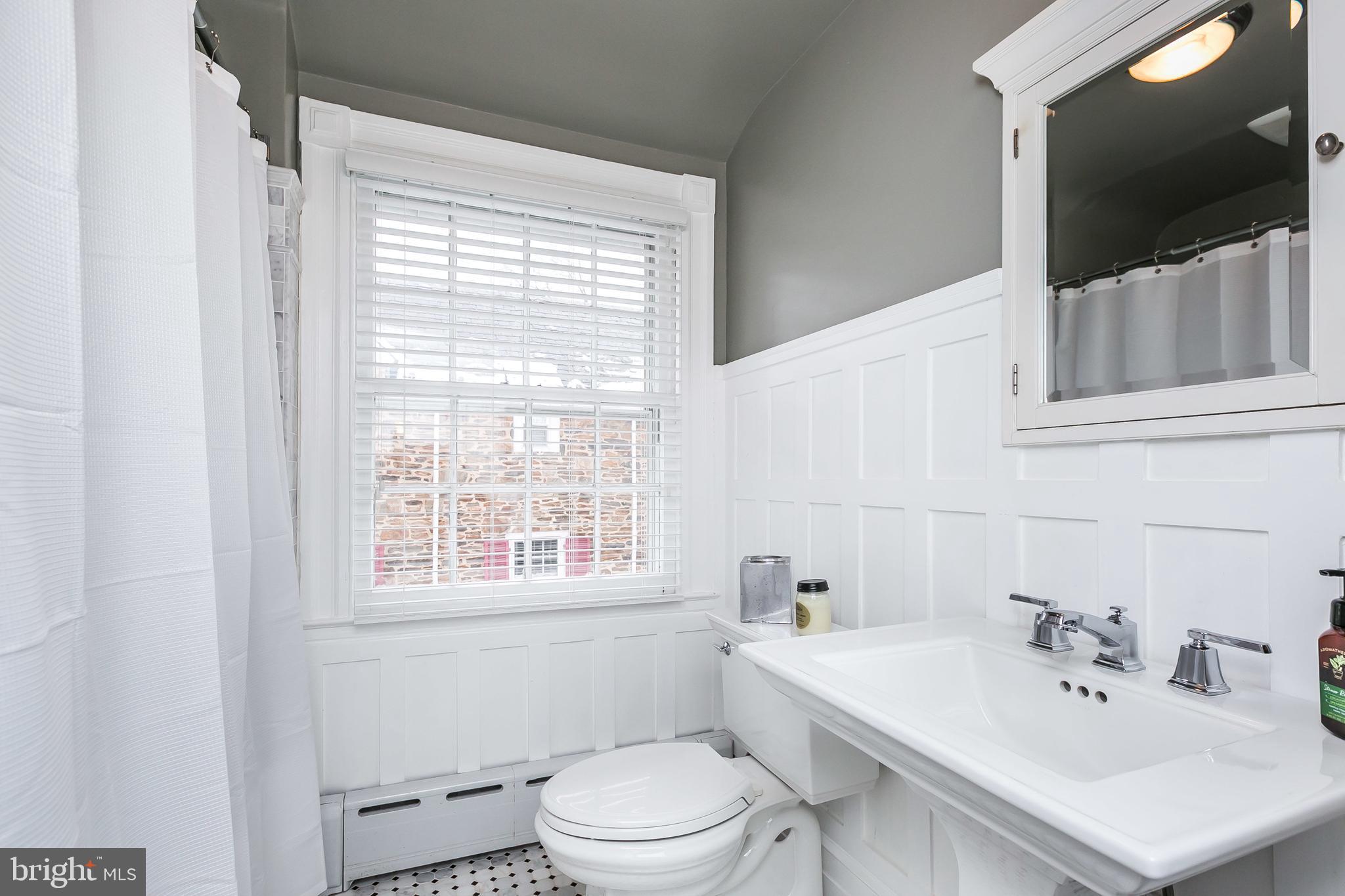 317 Tunbridge Road Baltimore, MD 21212 - Photo 22 of 42 The hall bath has been updated.