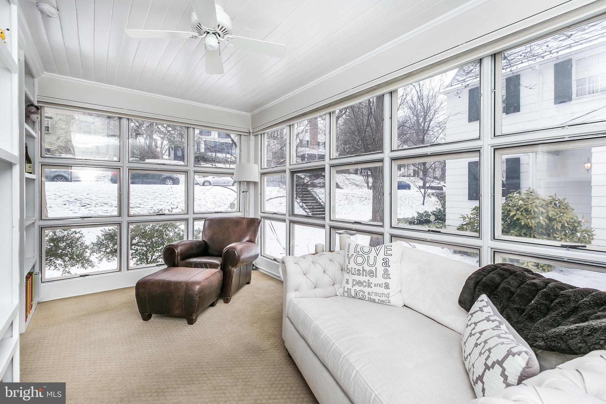 317 Tunbridge Road Baltimore, MD 21212 - Photo 10 of 42 The sun room is perfect for lounging and reading