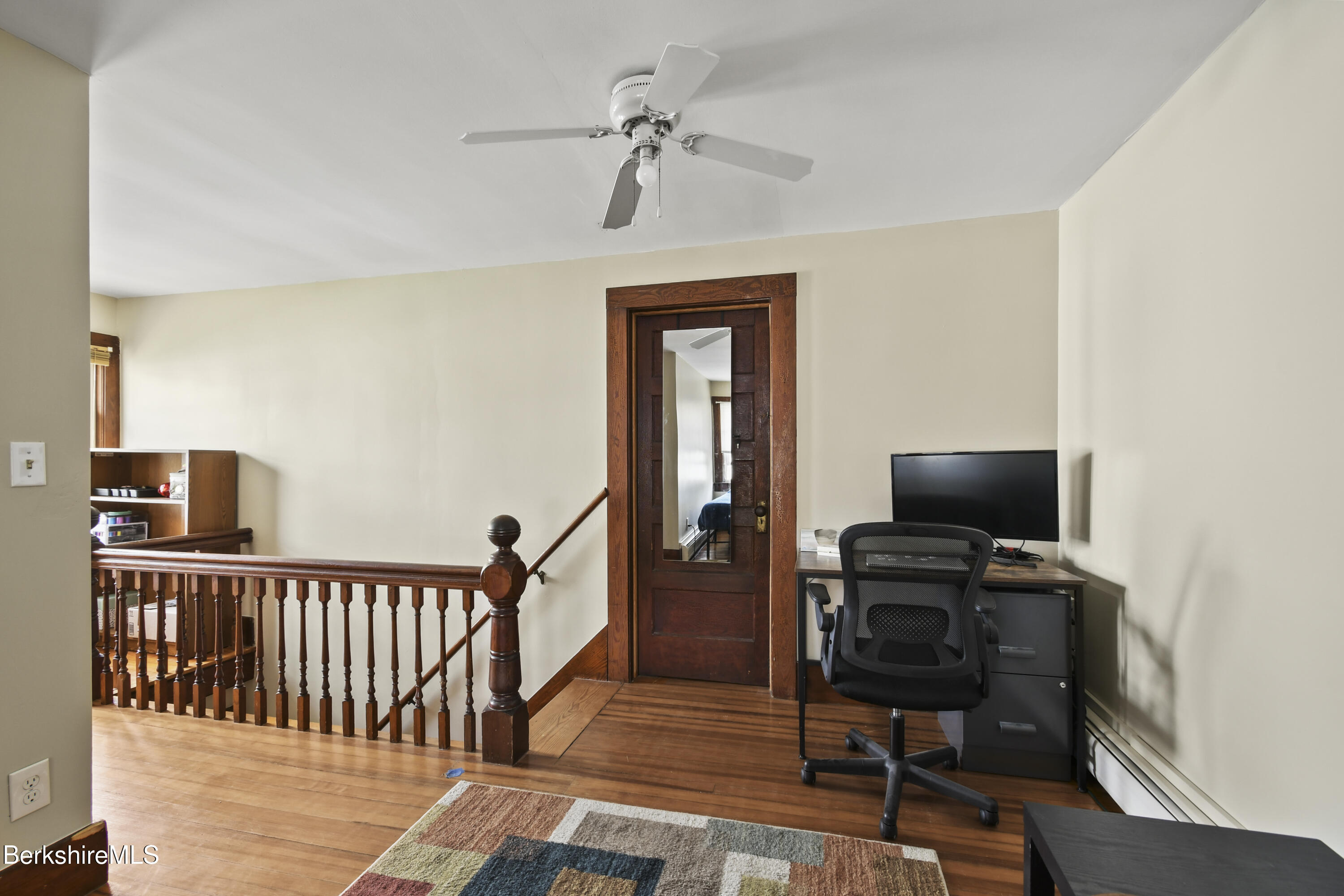 28 Upton Street Adams, MA 01220 - Photo 18 of 29 a view of a livingroom with furniture and wooden floor