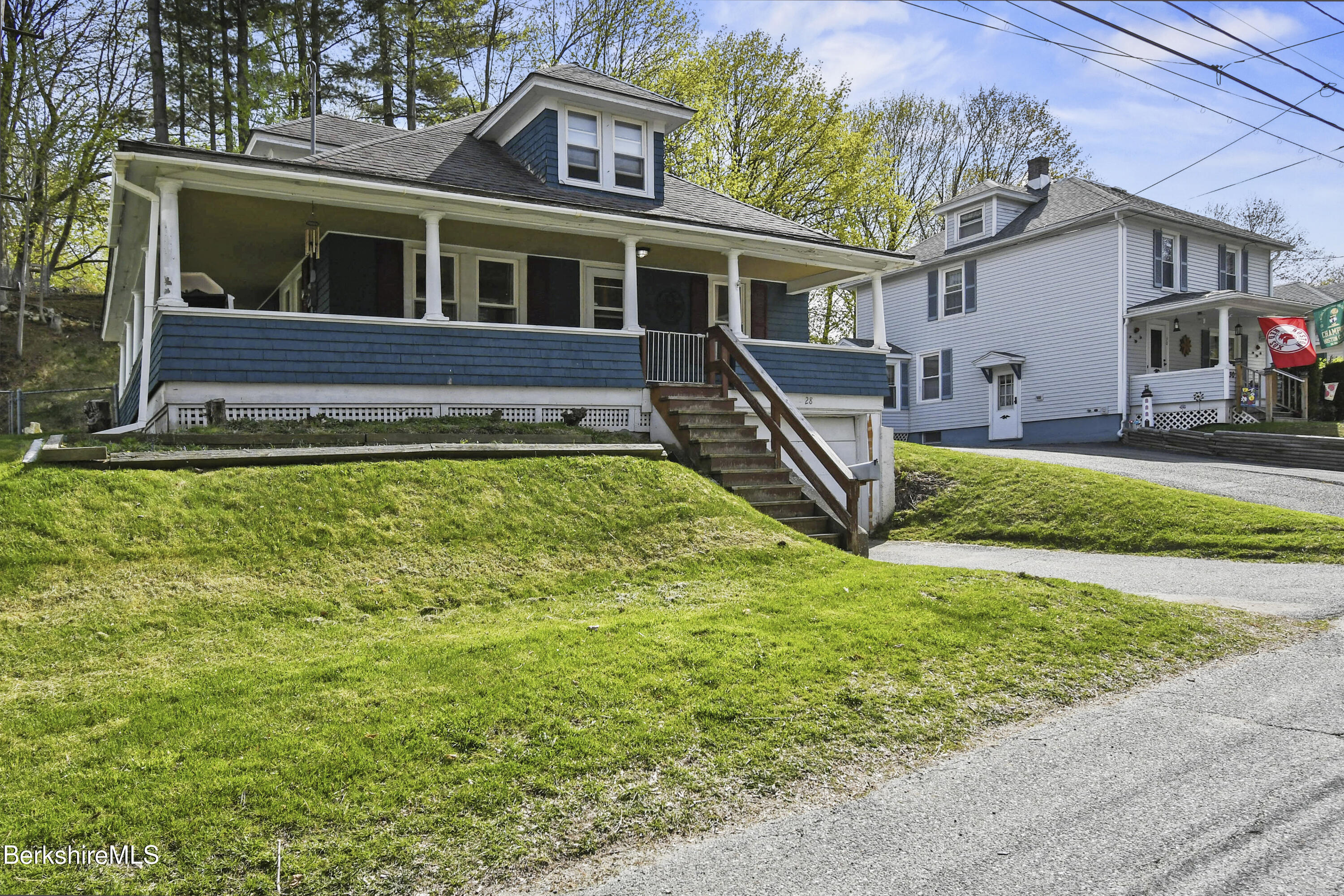 28 Upton Street Adams, MA 01220 - Photo 2 of 29 a view of a house with a swimming pool