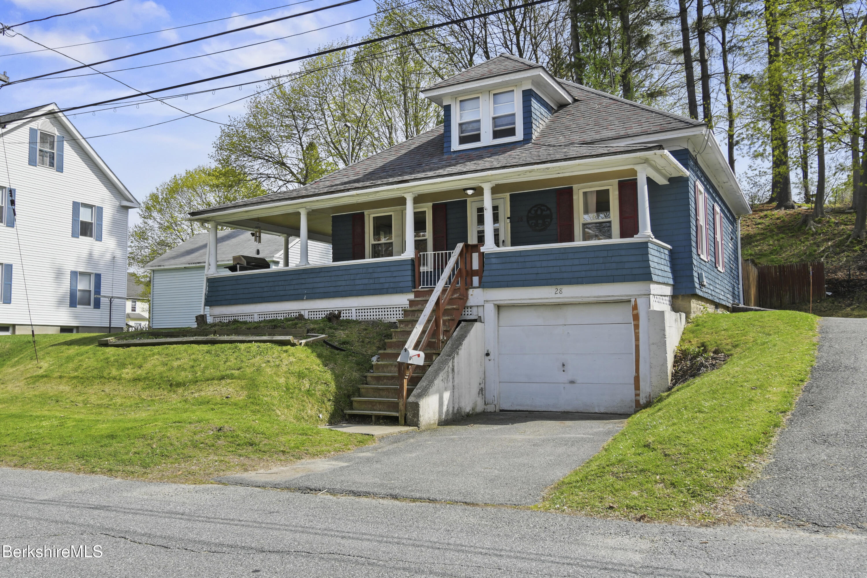 28 Upton Street Adams, MA 01220 - Photo 22 of 29 a front view of a house with a garden