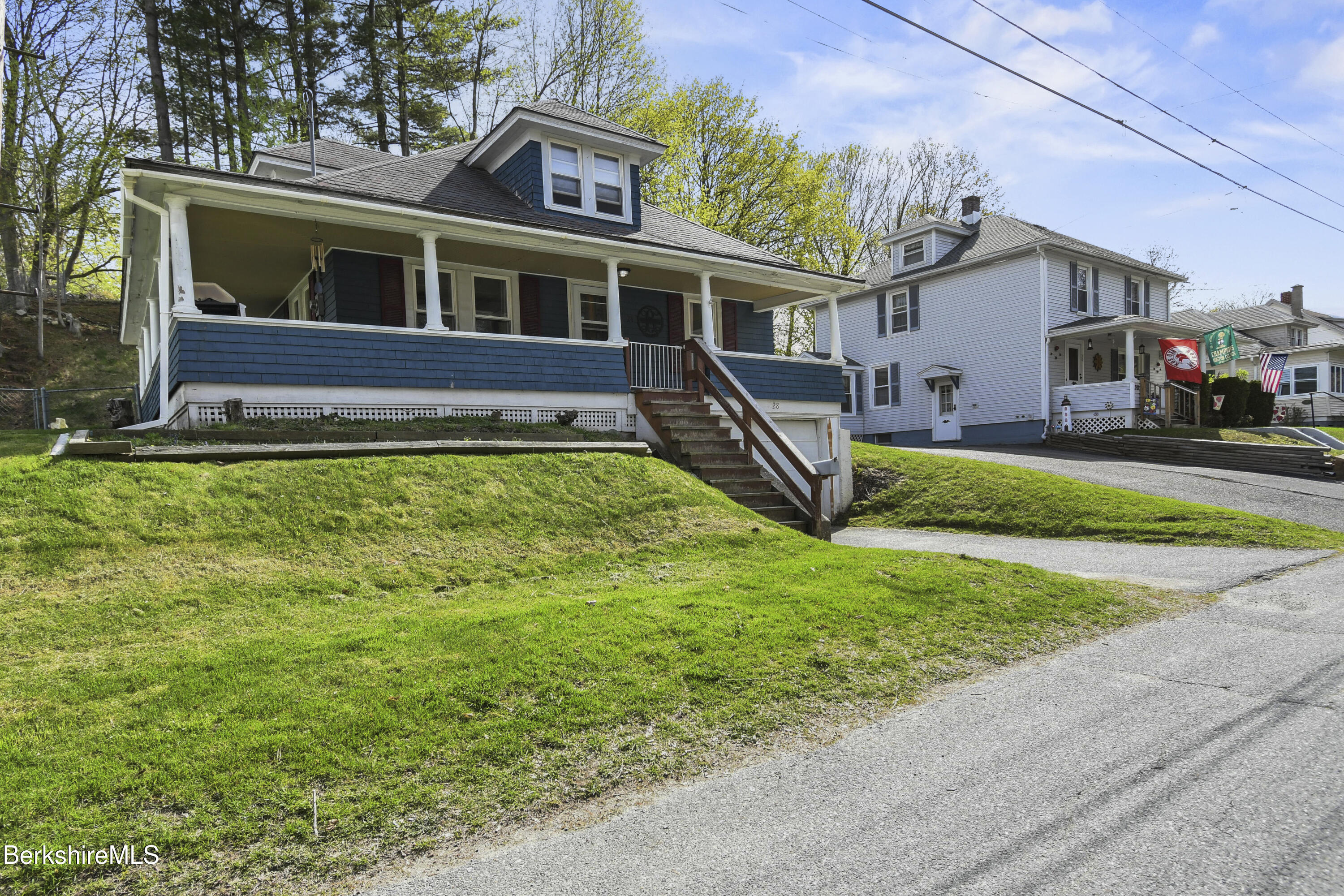 28 Upton Street Adams, MA 01220 - Photo 23 of 29 a view of a house with a yard and sitting area