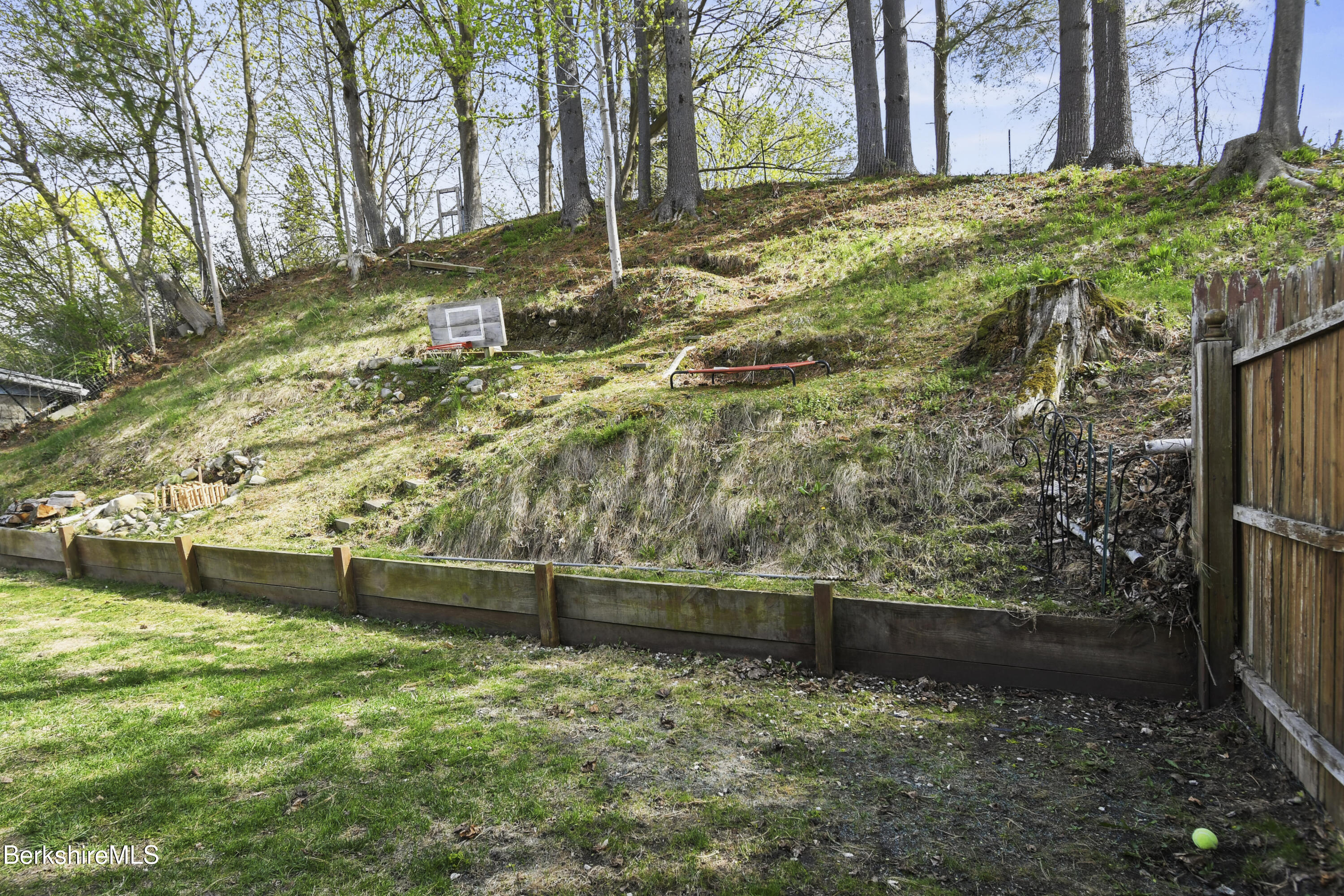 28 Upton Street Adams, MA 01220 - Photo 27 of 29 a view of backyard with wooden fence