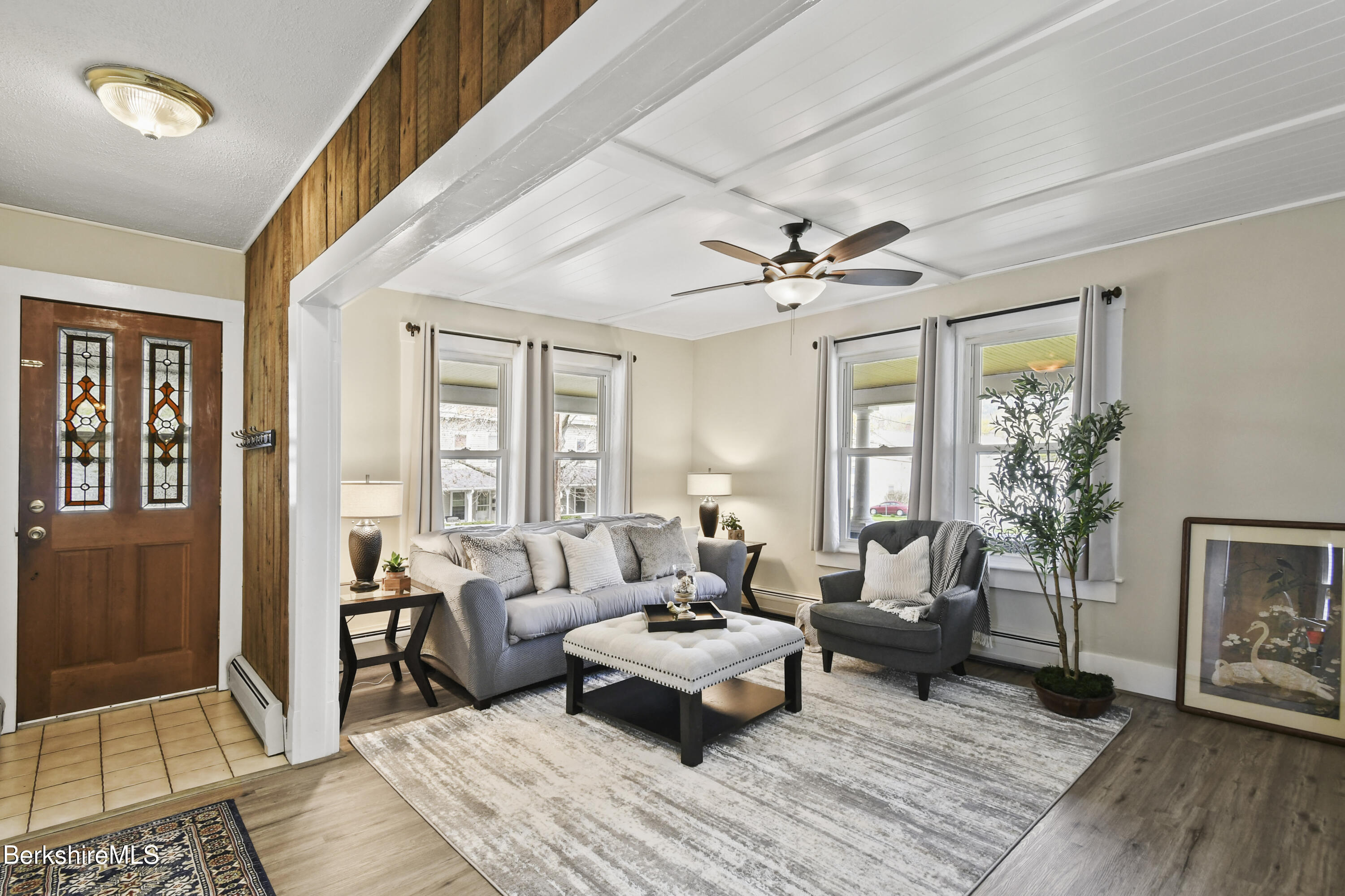 28 Upton Street Adams, MA 01220 - Photo 4 of 29 a living room with furniture and a chandelier