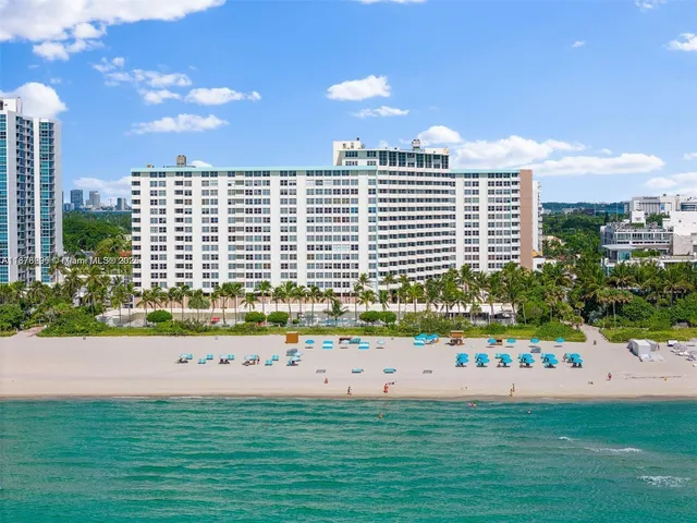 a view of a city with a big yard