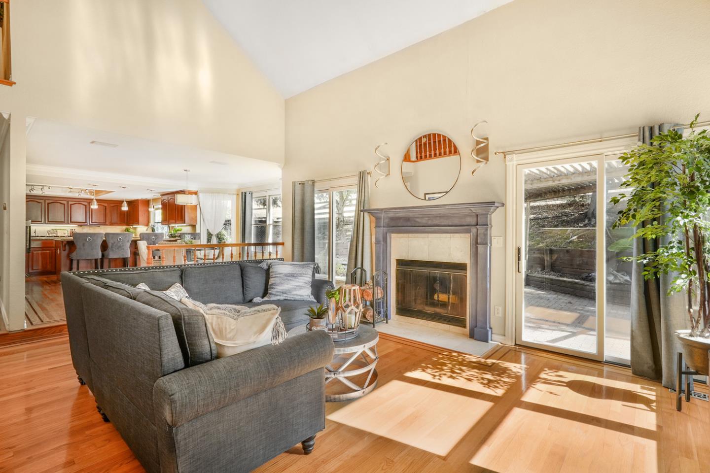 1245 Day Road Gilroy, CA 95020 - Photo 21 of 55 a living room with furniture and a fireplace