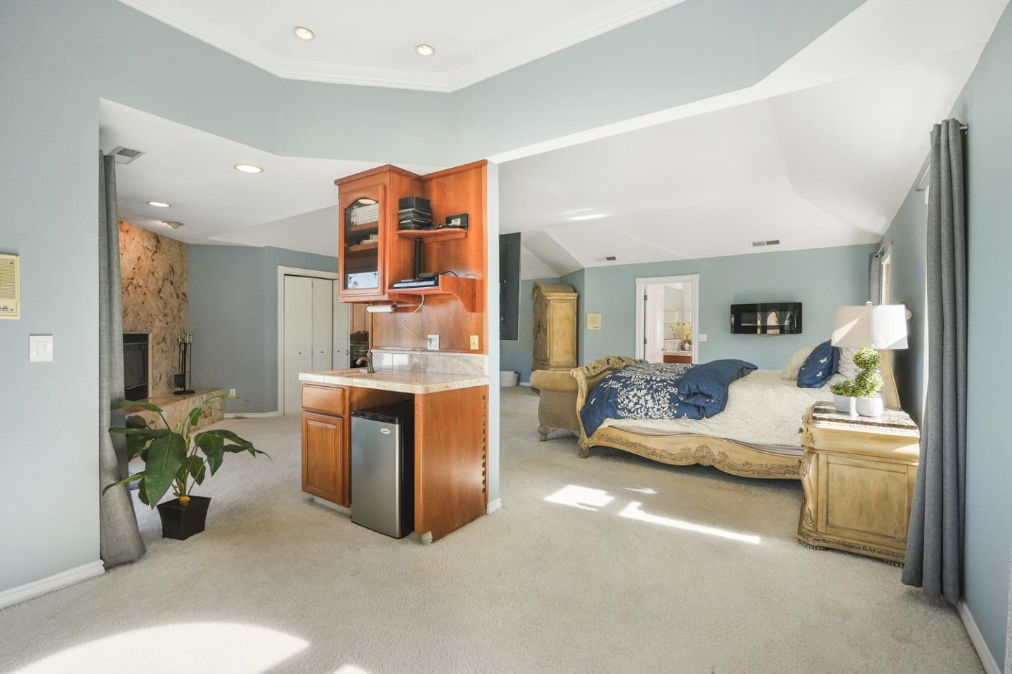 1245 Day Road Gilroy, CA 95020 - Photo 32 of 55 a living room with furniture and a potted plant
