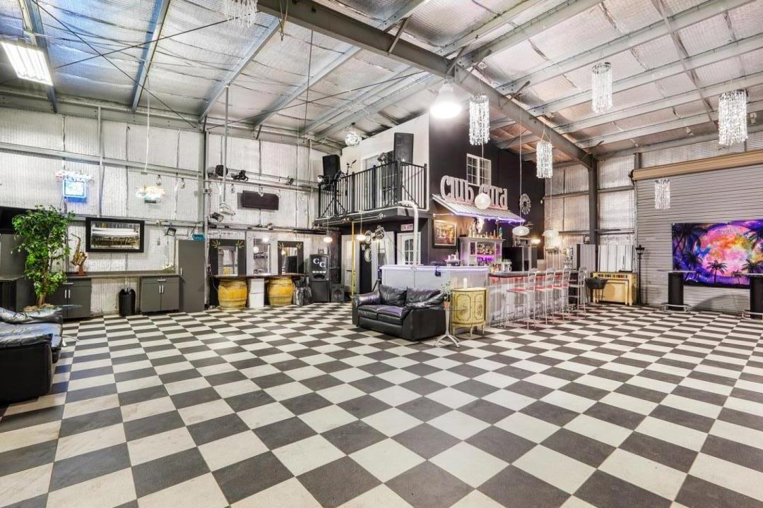 1245 Day Road Gilroy, CA 95020 - Photo 46 of 55 a building with a black and white checkered floor