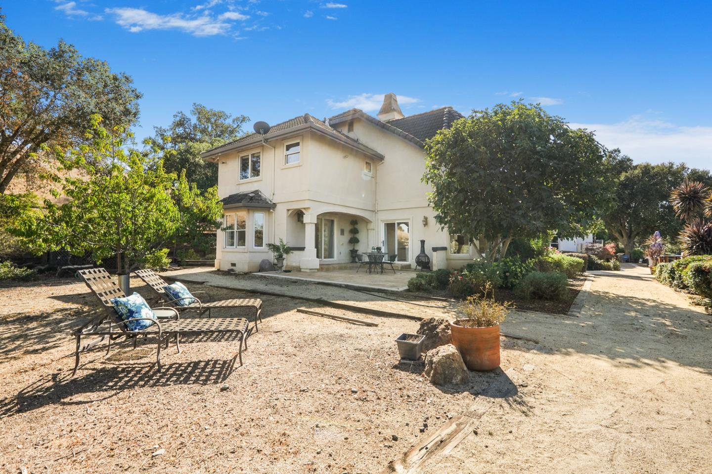 1245 Day Road Gilroy, CA 95020 - Photo 48 of 55 a view of a house with backyard and sitting area