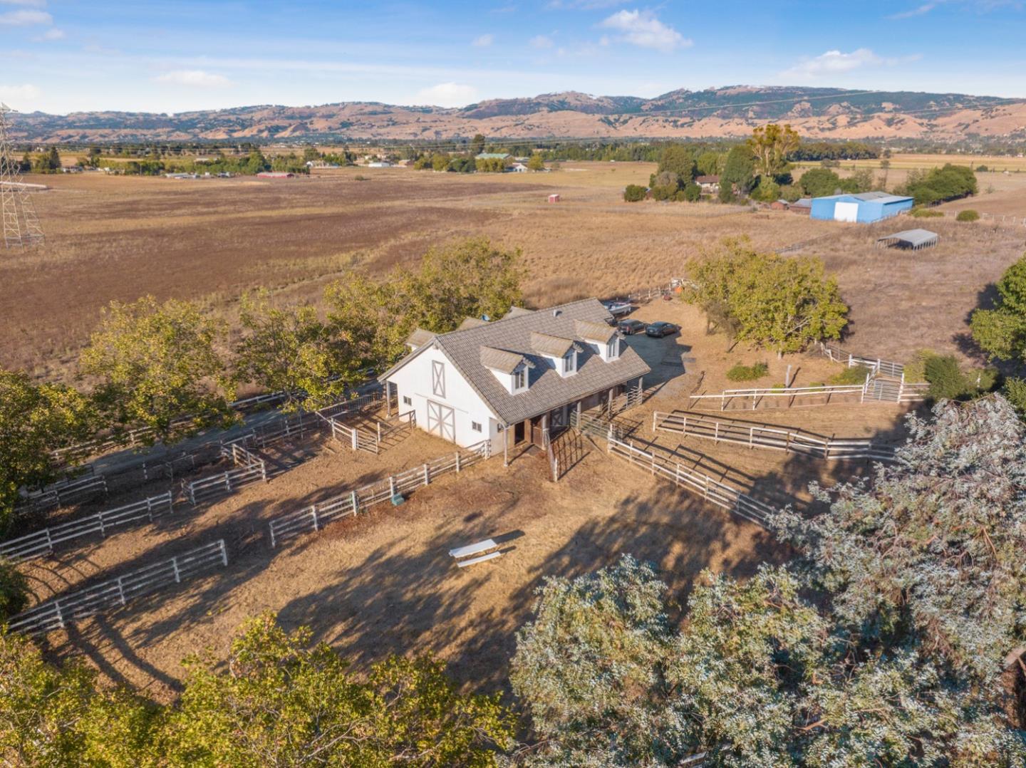 1245 Day Road Gilroy, CA 95020 - Photo 50 of 55 an aerial view of ocean with residential house with outdoor space and trees