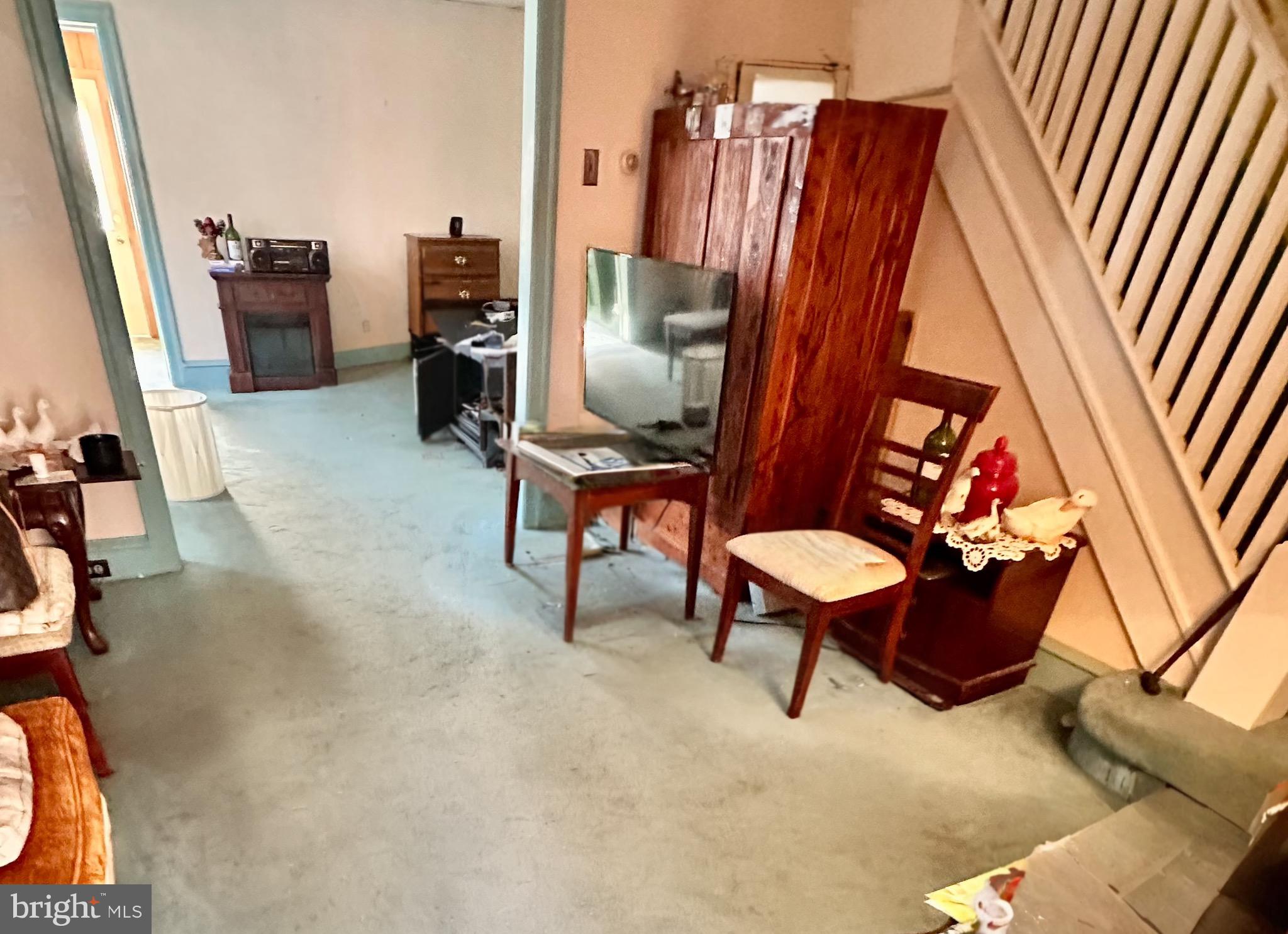 8019 Ryers Avenue Philadelphia, PA 19111 - Photo 3 of 10 a room with furniture and a rug