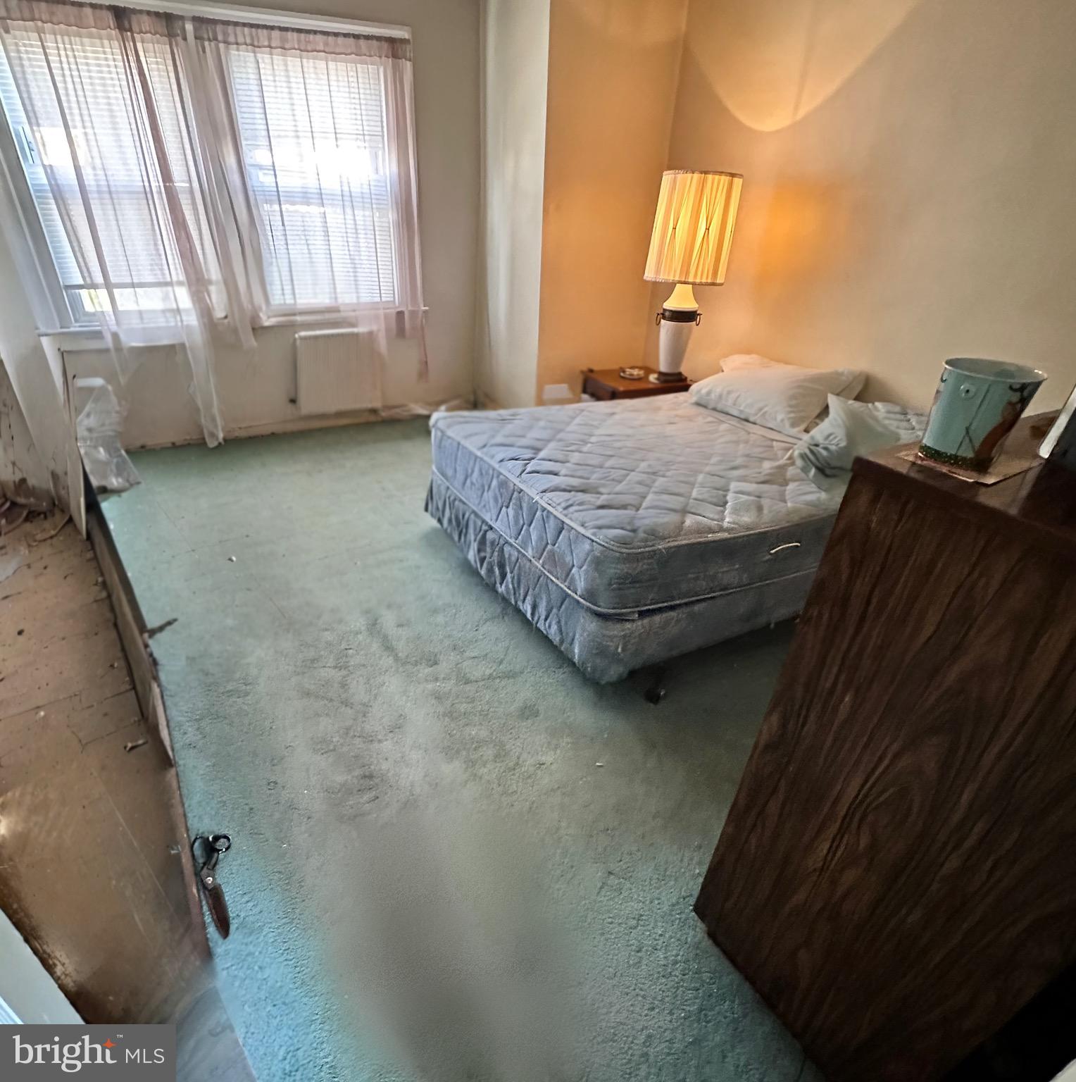 8019 Ryers Avenue Philadelphia, PA 19111 - Photo 10 of 10 a bedroom with a bed and window