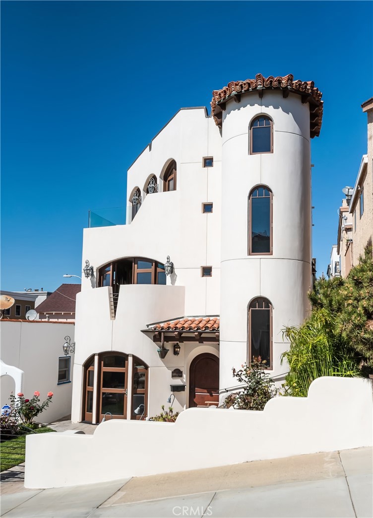 221 30th Street Manhattan Beach, CA 90266 - Photo 2 of 19 a large white building with a white roof